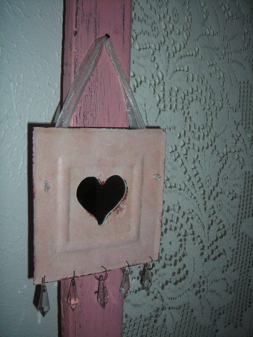 sweet little pink tin piece with heart mirror and dangly bling