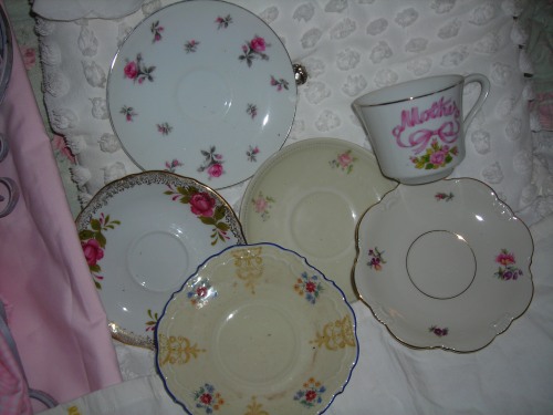 collection of little saucers and a sweet cup from cindy's sale